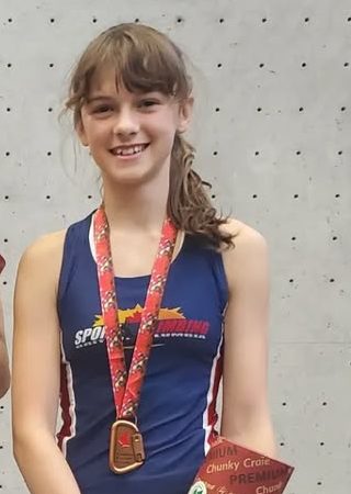 Maple Ridge teen Avery MacDonald set three new Canadian speed climbing records at the Youth World Championships in Helsinki, Finland.