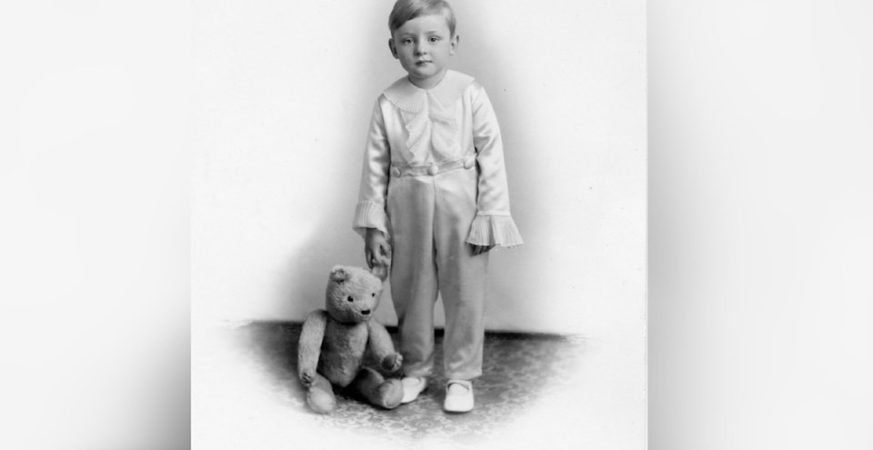 Eric Neville Dennison is shown in 1910 with his teddy bear
