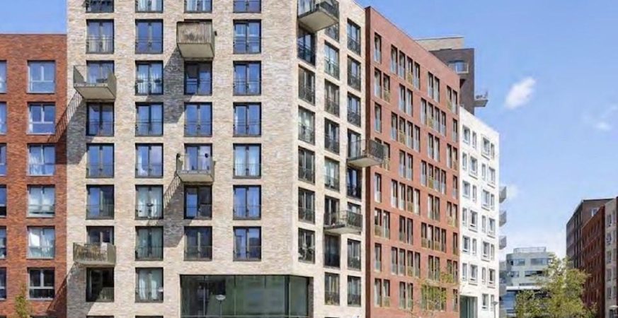 Modern mid-rise rental housing development with balconies in Surrey Whalley.