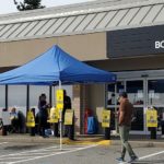 Surrey postal workers strike as new offer rejected